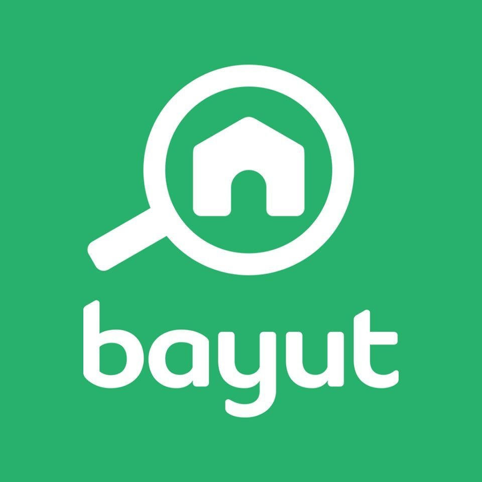 Bayut logo with a magnifying glass and house icon on a green background.